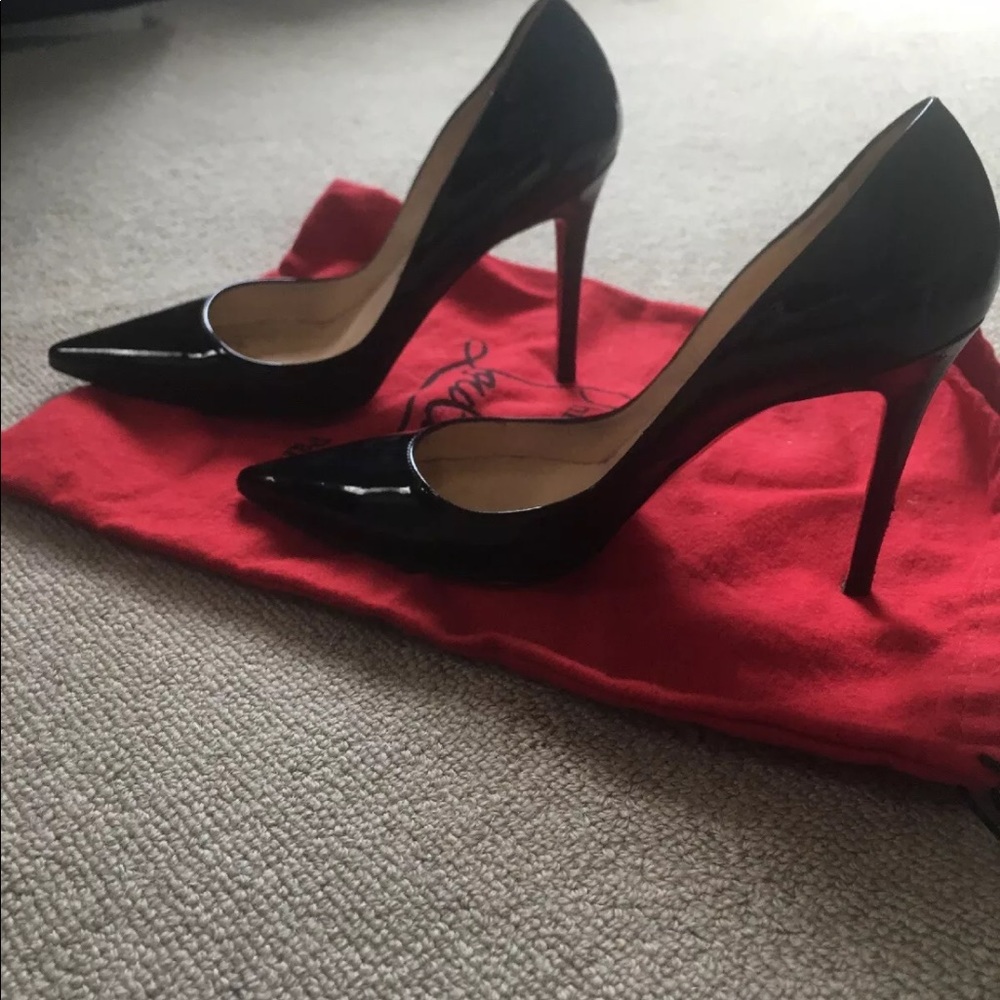 black patent leather Stilletos.